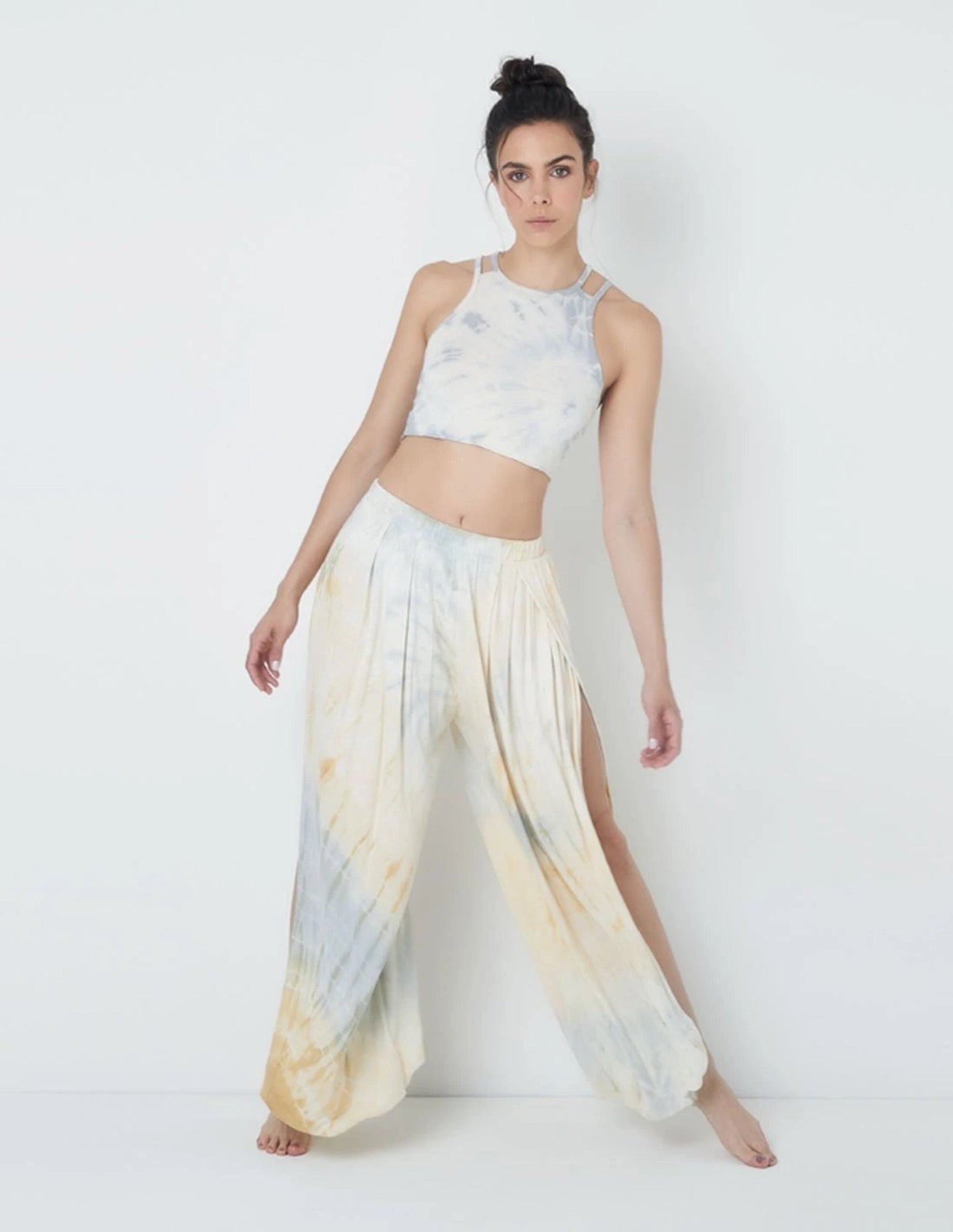 Side slit lounge/beach pant features an ultra comfortable fit and flowing design, with natural hand-dye process. The Andes Lounge Pant gets its beautiful blue and soft yellow hues from zero waste cabbage and turmeric natural tye-dye process. 